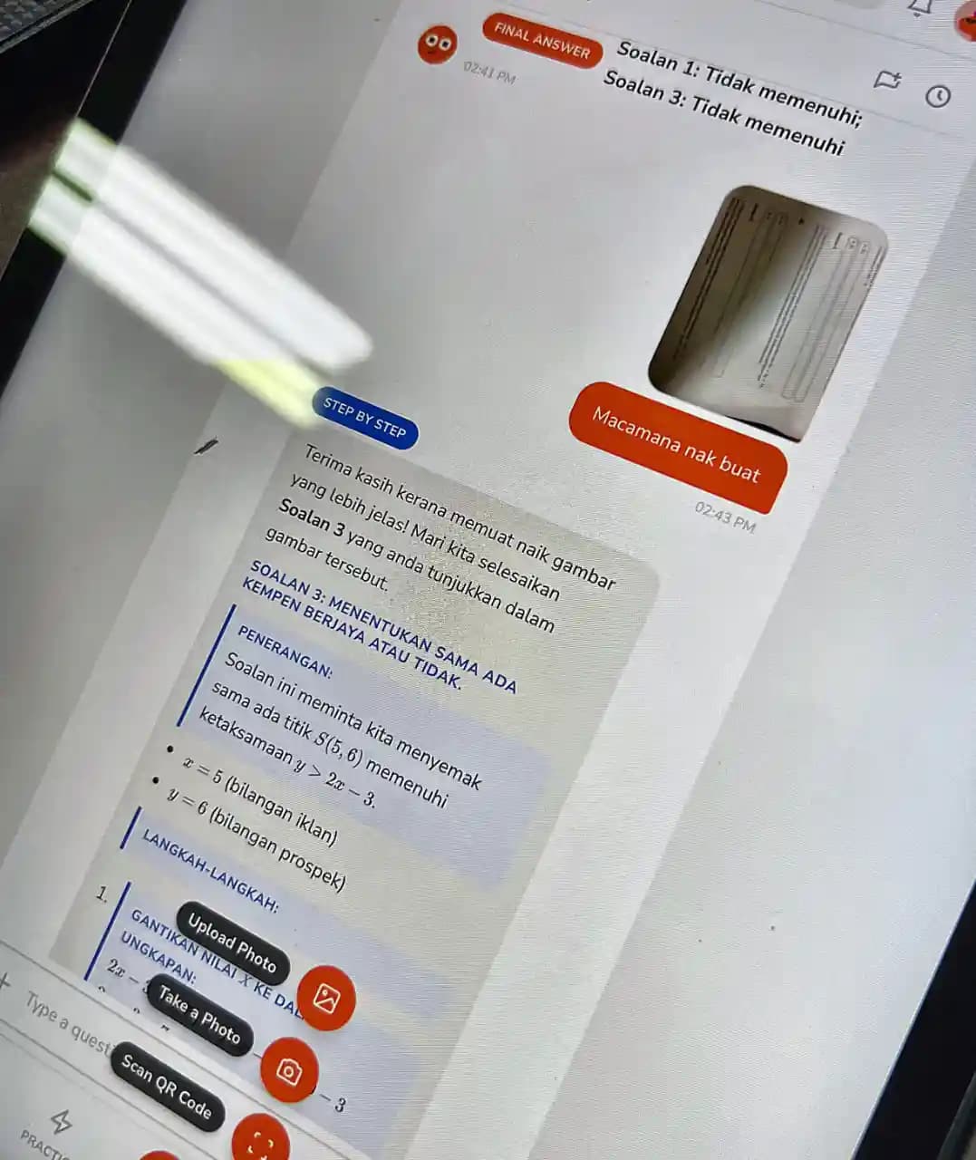 A student typing a maths question into the Tupai app